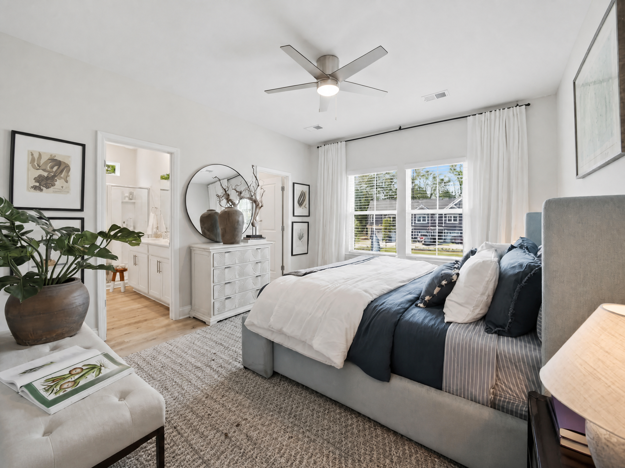 Coastal bedroom with navy and cream bedding