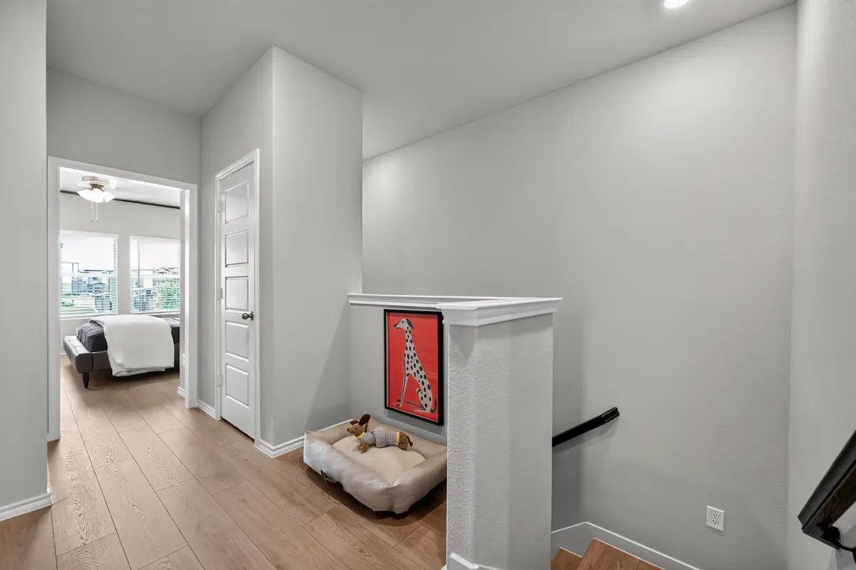 Upstairs landing styled with cozy pet nook